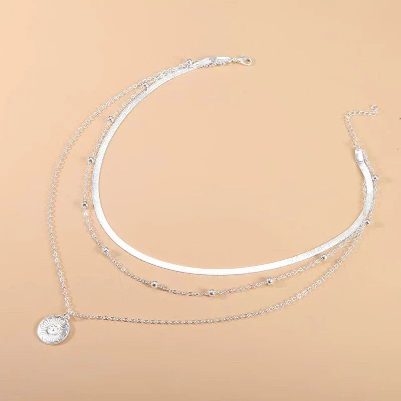Collier Triple
